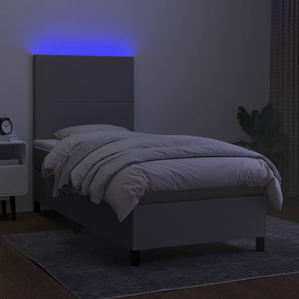 Letto a Molle Materasso e LED Grigio Chiaro 90x190 cm Tessuto